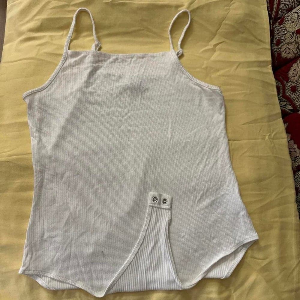 White ribbed tank top with thin vertical stripes