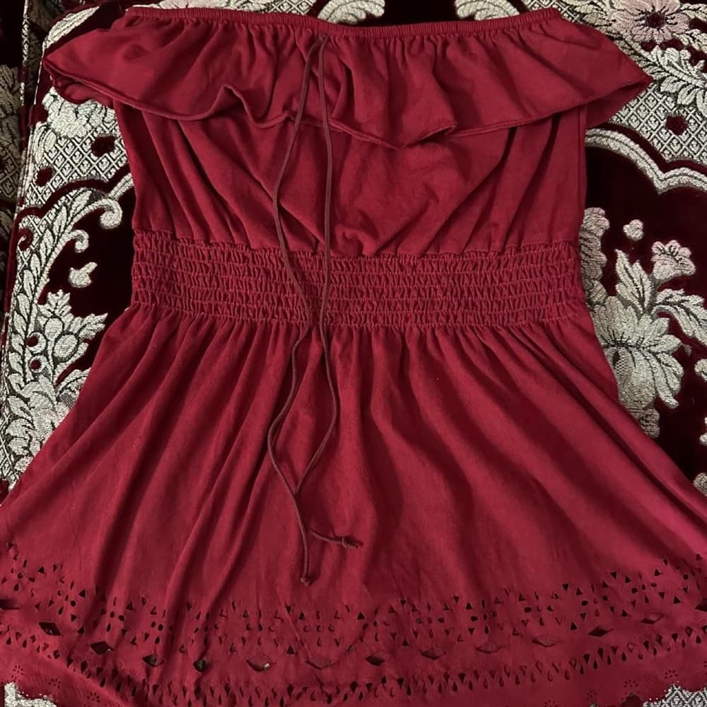 Burgundy off the shoulder top with lace trim and