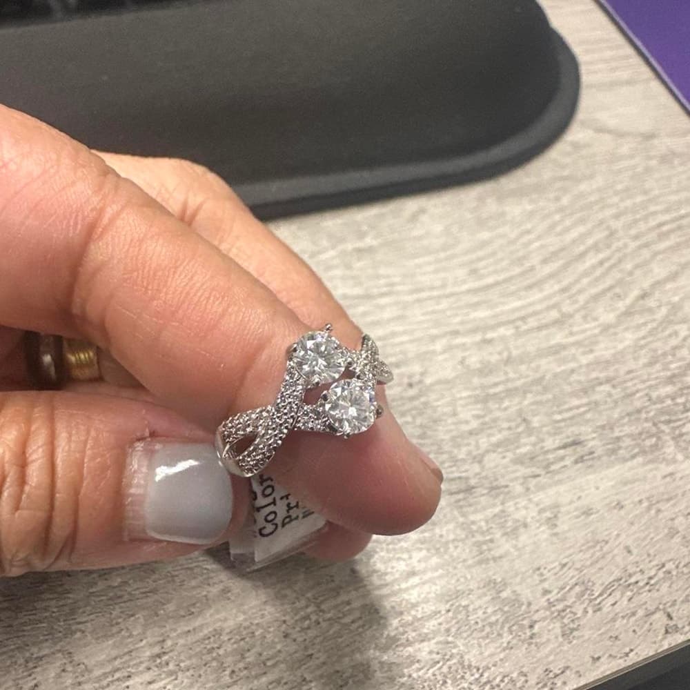 Silver Moissanites ring with two large round stones