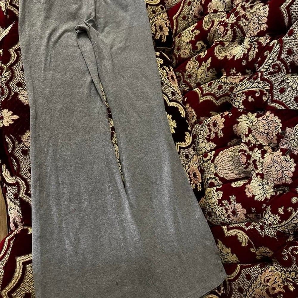 Gray flared sweatpants with elastic waistband