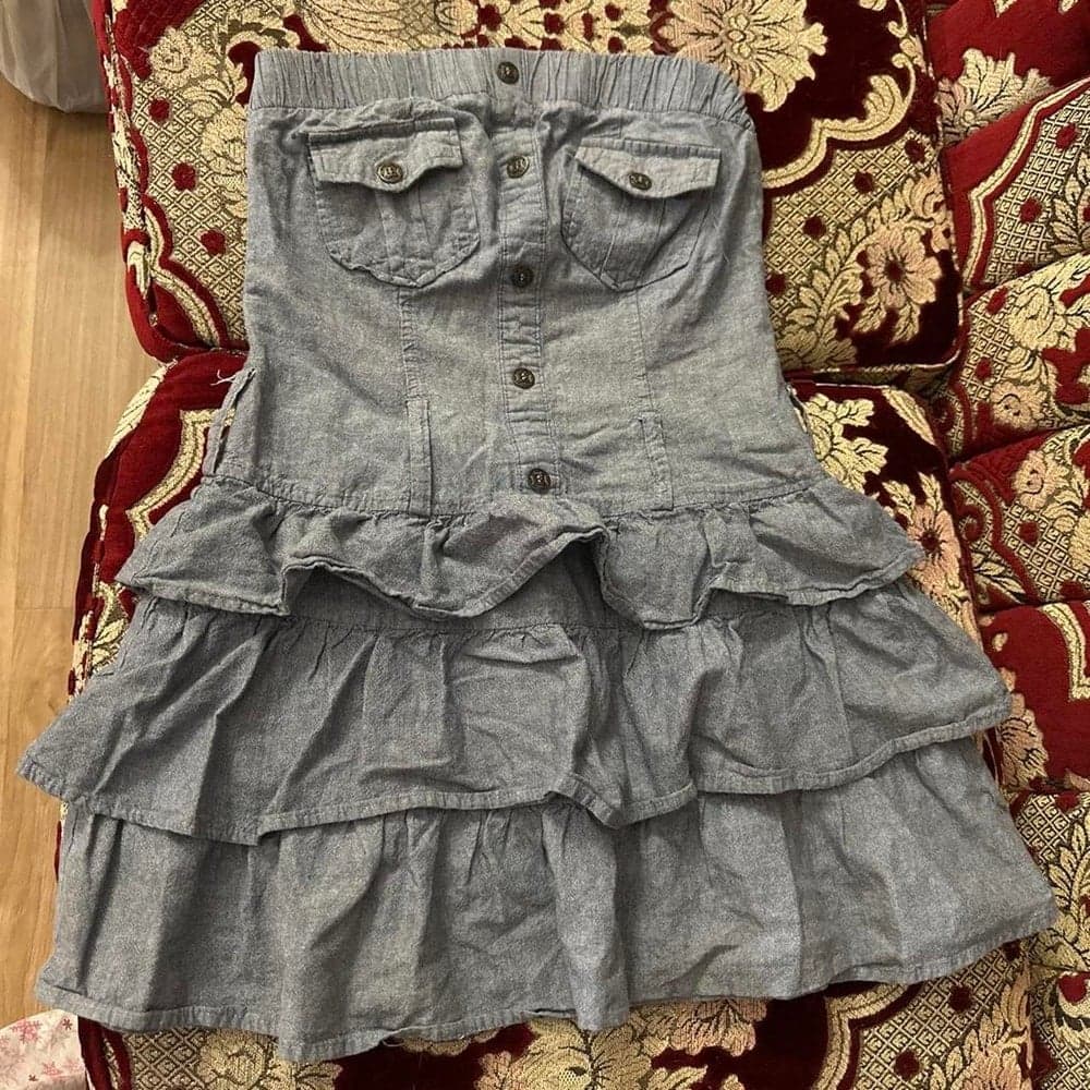 Gray denim mini skirt with ruffles and button-up