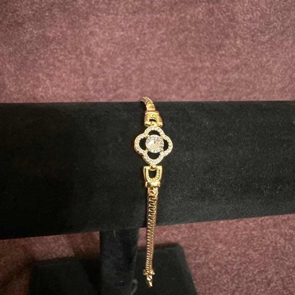 Gold field bracelet with diamond-like embellishments