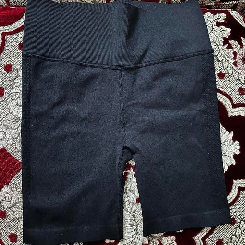 Black Love & Sports biker shorts in size M (8-10)